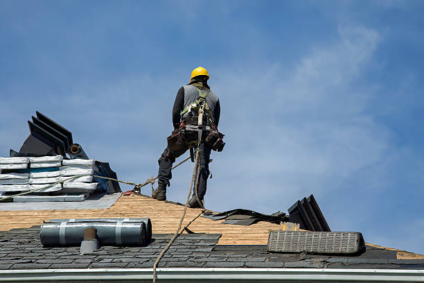 Professional Gutter Installation technician working in Bellevue, MI